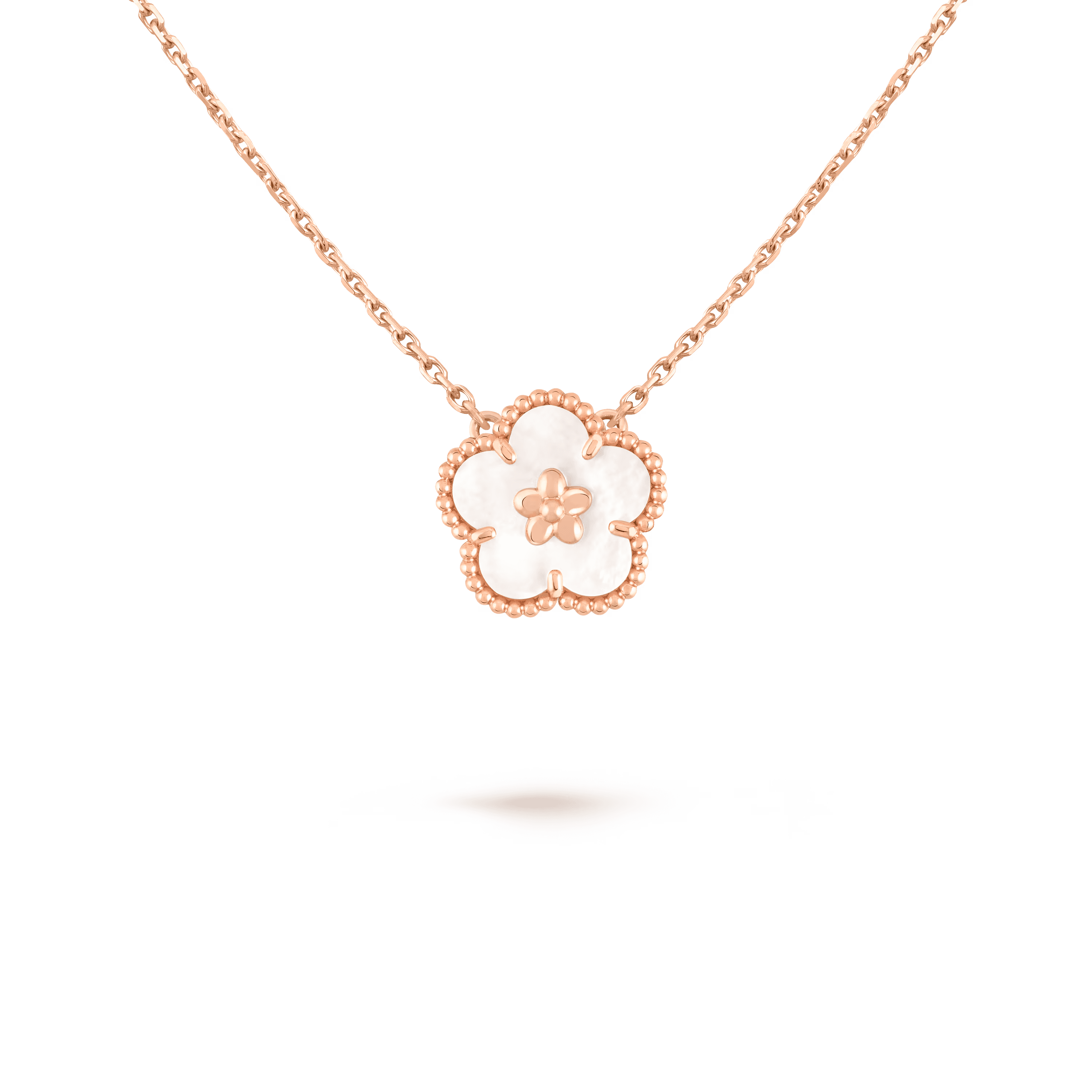 Van Cleef & Arpels. Підвіска Lucky Spring, квітка сливи із рожевого золота з білим перламутром