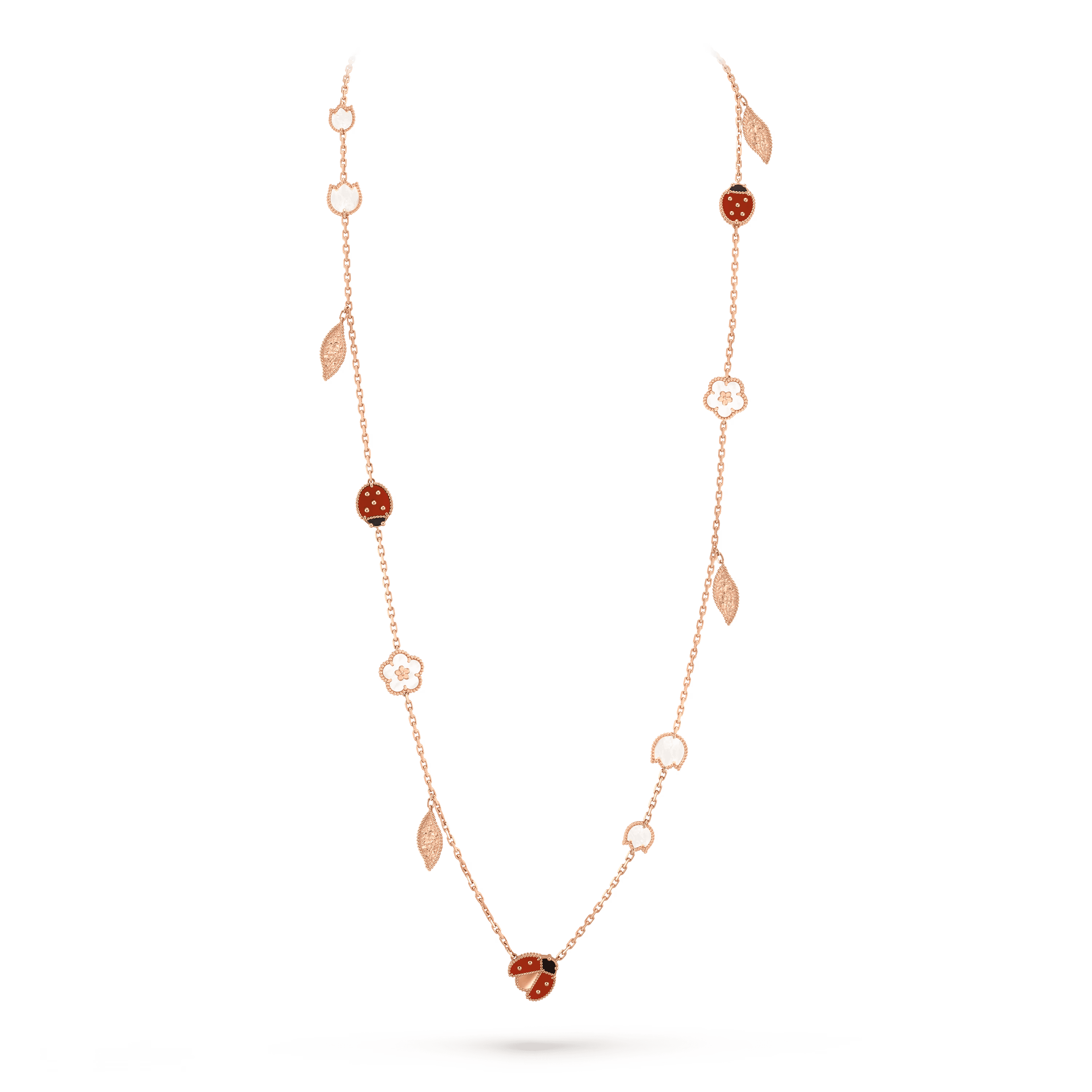 Van Cleef & Arpels. Довге кольє Lucky Spring із рожевого золота з білим перламутром, сердоліком та оніксом