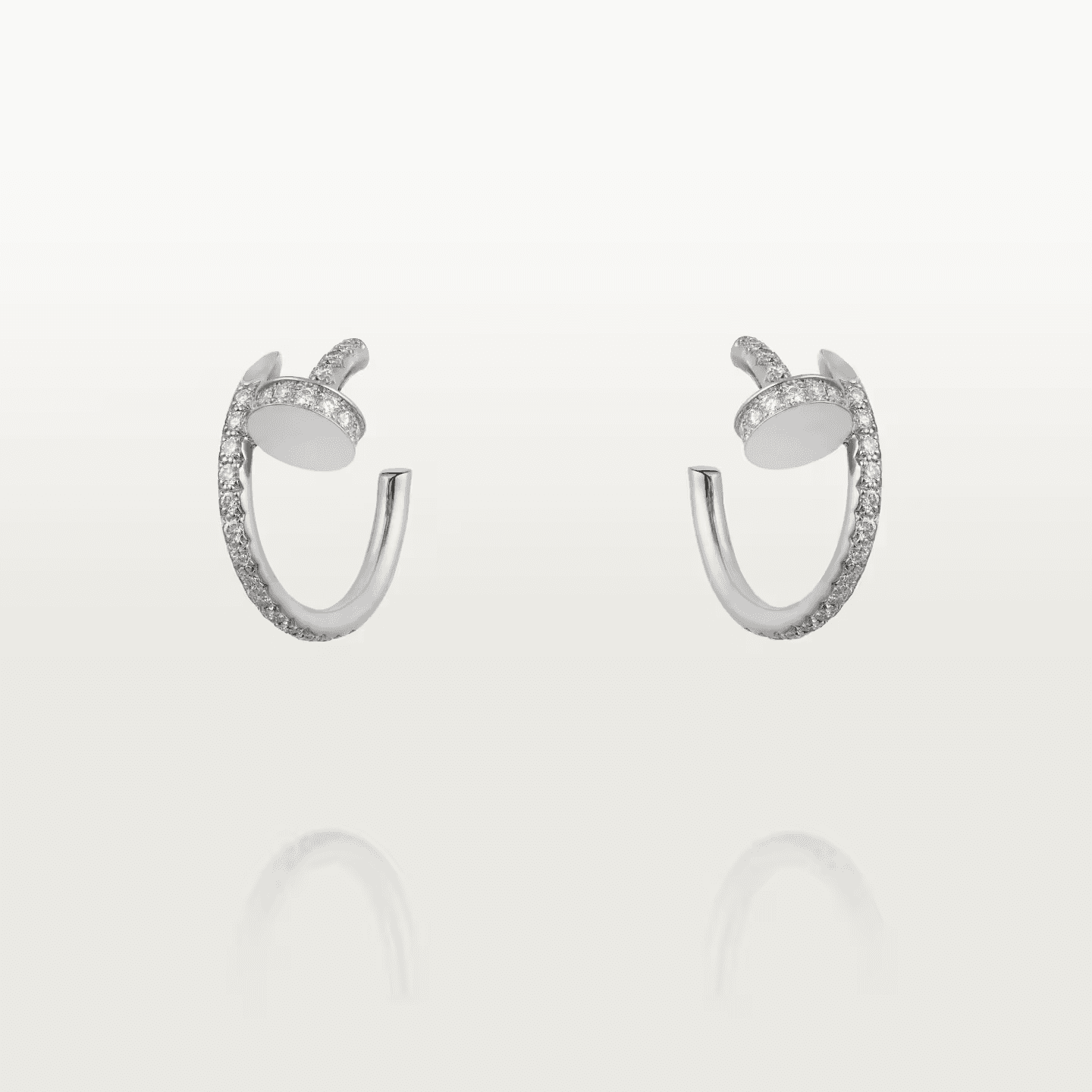 Cartier. Сережки-кільця Juste un Clou, маленька модель