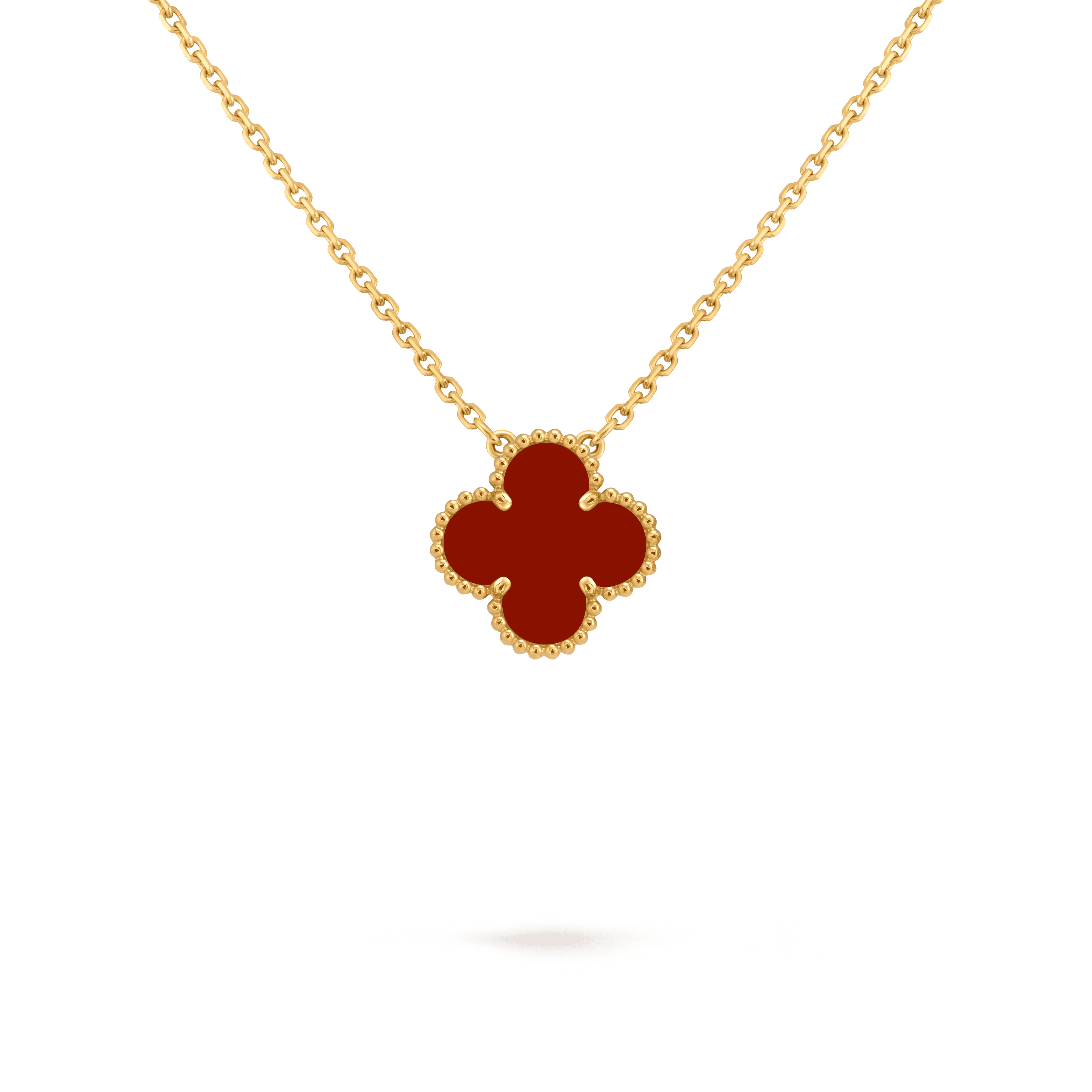 Van Cleef & Arpels. Підвіска Vintage Alhambra із жовтого золота з корнеолом