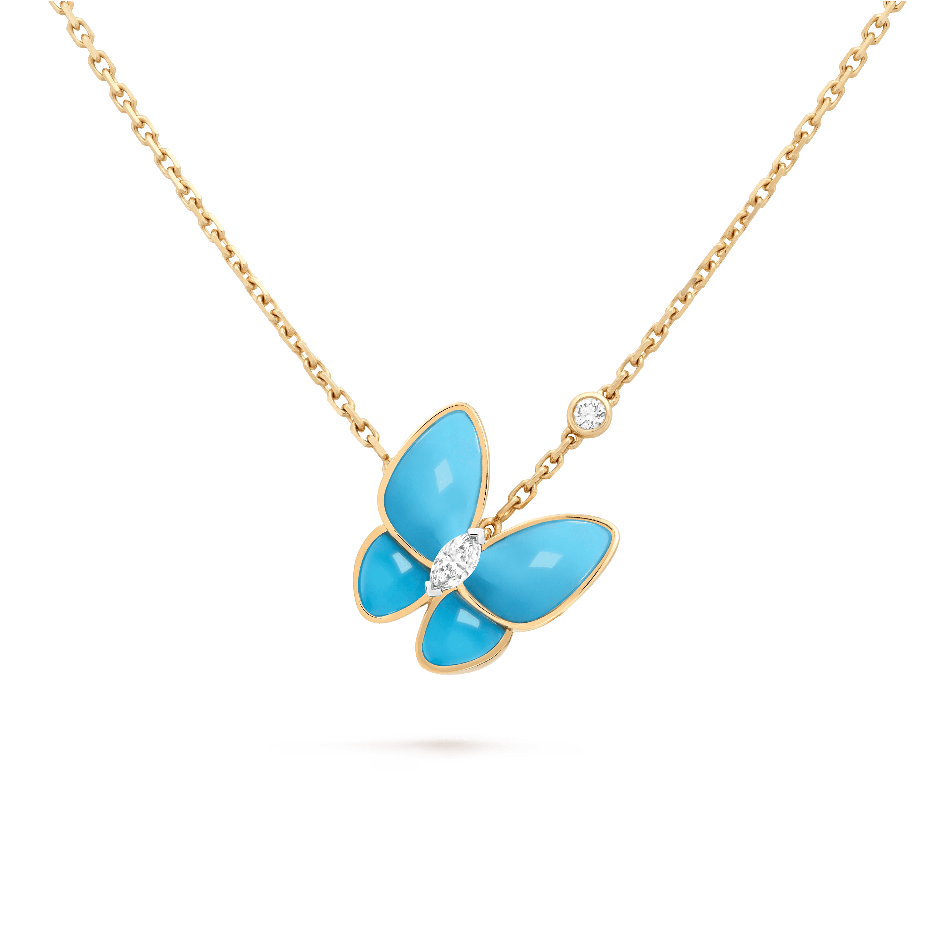Van Cleef & Arpels. Підвіска Two Butterfly із жовтого золота з бірюзою